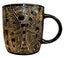 Black mug with gold intricate patterns on a white background