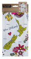 A packaged cotton tea towel featuring a colorful New Zealand map design with flowers, birds, and the words 'New Zealand' on a white background. The header card shows 'TEA TOWEL 100% cotton' and a small inset of the reverse pattern.