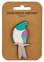 Handmade magnet shaped like a bird on a brown backing card with 'Kererå' branding.
