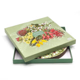 Floral-themed product packaging with a green background