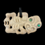 Carved bone pendant with green eyes on a black background