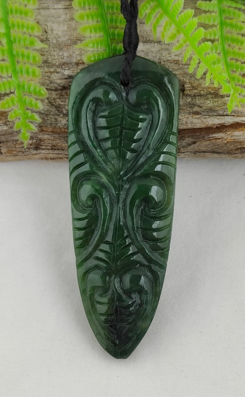 NZ Greenstone Tongue With Koru Design #48