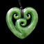Greenstone heart-shaped pendant with spiral design on a black background