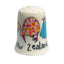 Decorative thimble with kiwi bird design and 'New Zealand' text on a white background