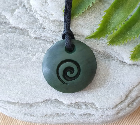 NZ Greenstone Round Pendant with Koru Carved into it
