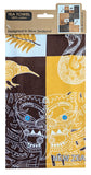 A packaged cotton tea towel with a New Zealand-inspired tribal design. The packaging header reads 'TEA TOWEL 100% cotton' and 'Designed in New Zealand'.