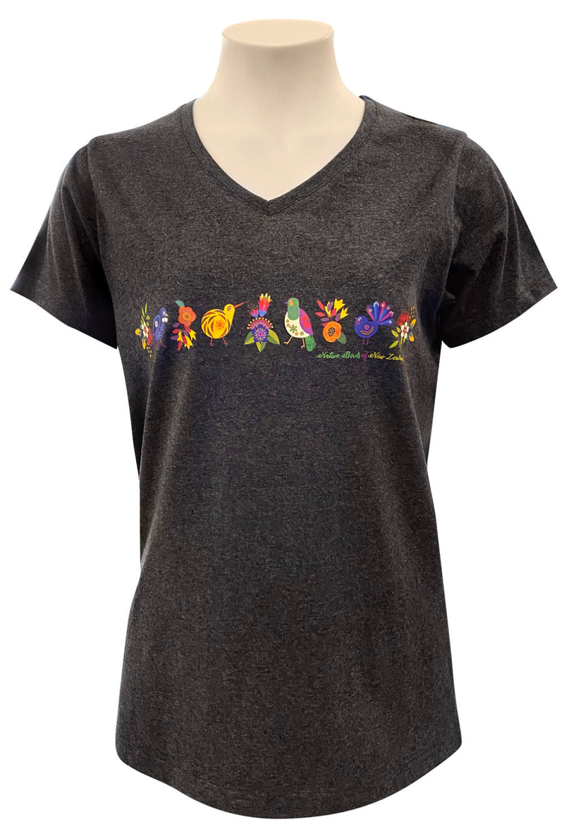 Black t-shirt with colourful bird design on a mannequin against a white background