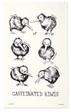 An off-white rectangular tea towel or poster featuring six black hand-drawn sketches of kiwi birds with handwritten labels and the text 'CAFFEINATED KIwis' at the bottom.