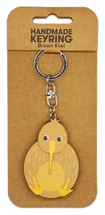 Handmade keyring with a brown kiwi design on a cardboard backing