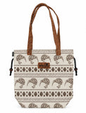 A tote bag with a cream canvas body featuring a brown kiwi bird and geometric tribal pattern, brown faux-leather handles, and a brown leather patch with the 'wild kiwi' logo.