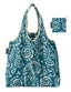A reusable tote bag with a teal and cream maori tribal swirl pattern, shown alongside its matching carrying pouch on a solid white background.
