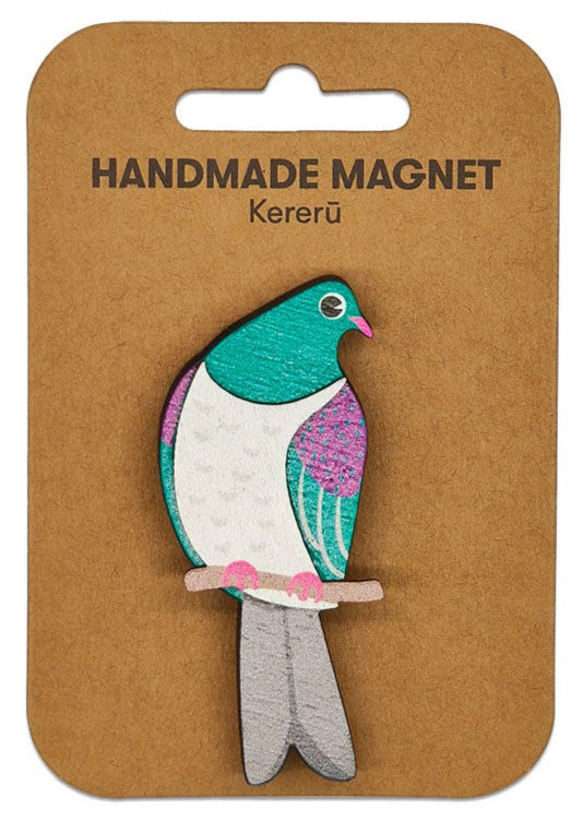 Handmade magnet shaped like a bird on a brown backing card with 'Kererå' branding.