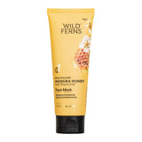 Yellow tube of Wild Ferns Manuka Honey Face Mask on a white background