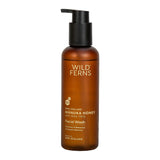Brown bottle of Wild Ferns facial wash on a white background