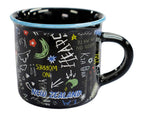 A black enamel mug with a light blue rim, decorated with colorful hand-drawn doodles and the words 'NEW ZEALAND' in blue. The mug is photographed on a clean white background.