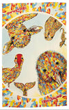 A printed tea towel featuring colorful New Zealand animal illustrations, including a kiwi, rabbit, duck, and seal, arranged inside a circular frame with a multicolored abstract border. The words "New Zealand" appear in red near the top and bottom.
