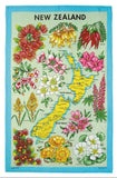 A rectangular tea towel featuring a vintage-style map of New Zealand surrounded by colorful illustrated flowers and green leaves, with a turquoise border on a white background.