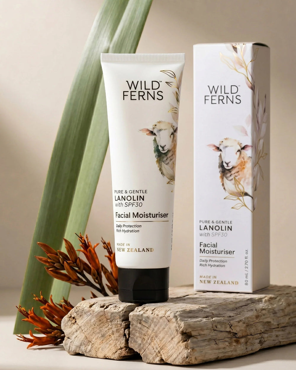 Wild Ferns facial moisturizer tube and packaging on a wooden surface with plants in the background