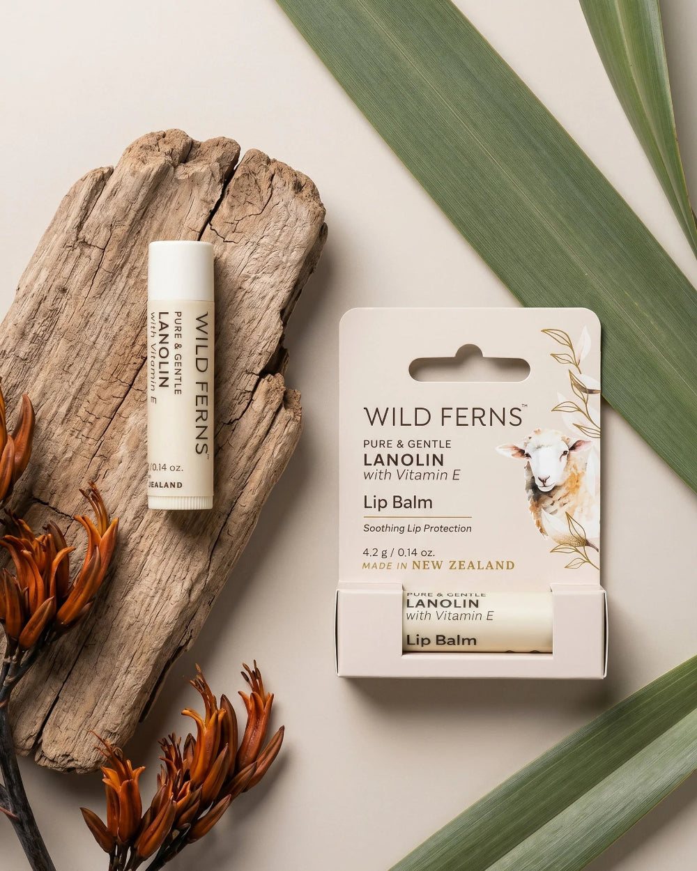 Wild Ferns lip balm with packaging on a natural background