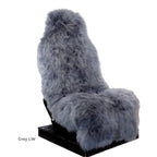 Grey sheepskin car seat cover on a white background