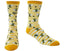 A pair of crew socks with a yellow and white striped pattern, decorated with black and yellow bee motifs and the text 'QUEEN BEE'.