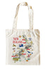 An off-white canvas tote bag featuring a colorful illustrated map of New Zealand with various landmarks, animals, and the text 'NEW ZEALAND' in red, shown against a plain white background.