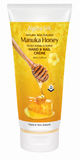 Alpine Silk Manuka Honey Hand & Nail Crème in a 85ml squeeze tube. The packaging features a bright yellow honey-themed label with an illustration of a wooden honey dipper dripping honey and a block of honeycomb, set against a plain white background.