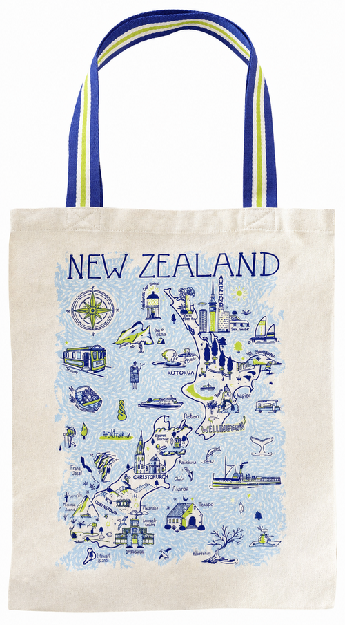 A canvas tote bag featuring a blue and yellow illustrated map of New Zealand with the text 'NEW ZEALAND' printed across the top. The bag has a natural off-white body and blue straps with yellow stripes. Main image