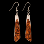 Bone earrings on a black background
