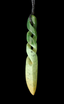 Green jade pendant with a twisted design on a black background