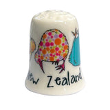 Decorative thimble with kiwi bird design and 'New Zealand' text on a white background