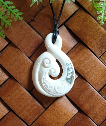 Twist With Paua Bone Carving Pendant Main image